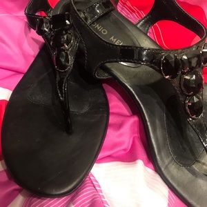 Black patent Leather sandals.